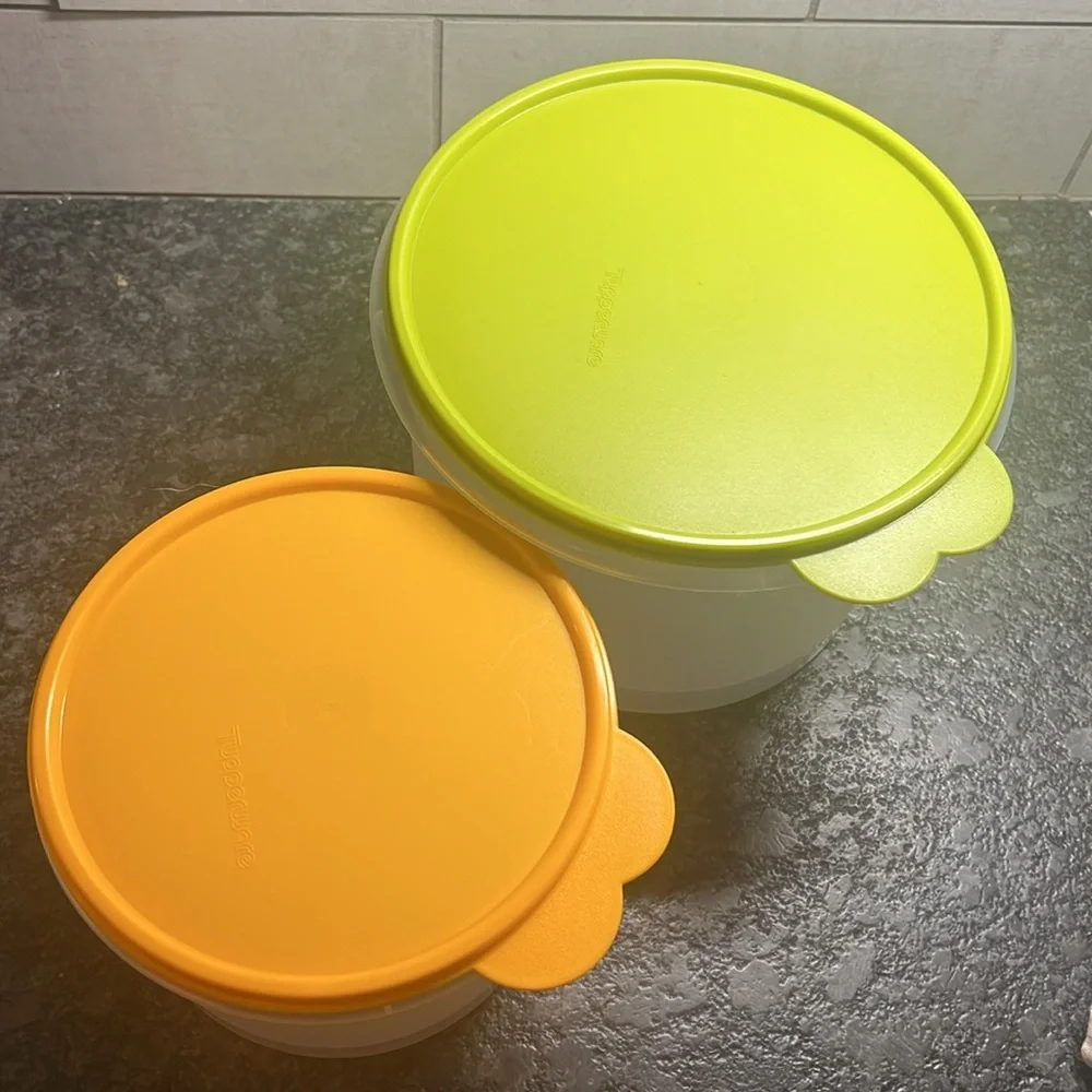 Brand new never used Round Tupperware containers with tight fitting lids